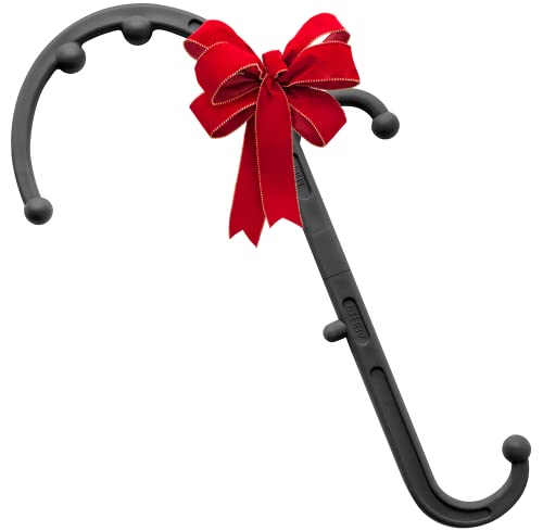 a black umbrella with a red bow