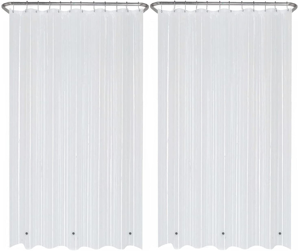 a pair of white shower curtains