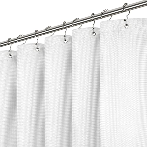 a shower curtain with a metal rod