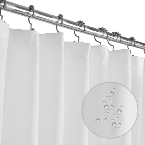 a shower curtain with a drop of water