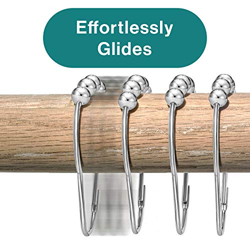 a group of silver hooks on a wooden bar with text: 'Effortlessly Glides'
