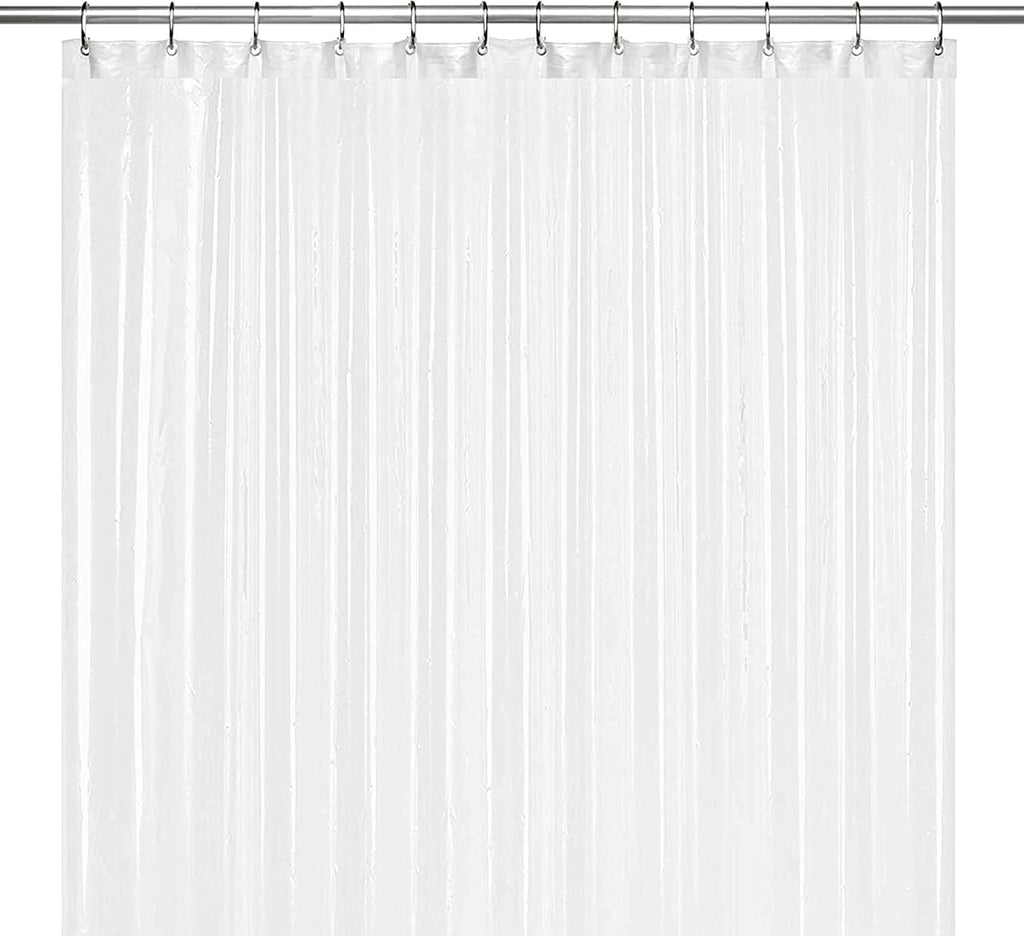 a white shower curtain with metal hooks